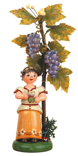 hubrig child of autumn grapes german wooden figurine with grape cluster