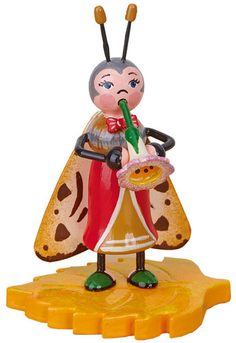hubrig beetle band moth with flower trumpet retired figurine