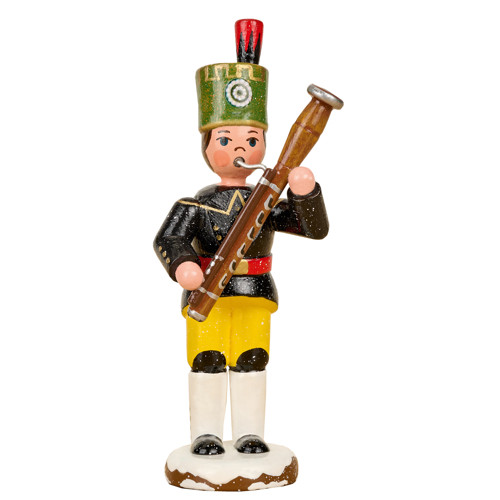 bergsmann band figurine holding bassoon on snowy base