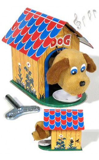Vintage tin dog house wind‑up toy with plush golden pup eating from dish