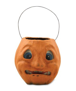 vintage paper mache jack o lantern with primitive scuffs and vellum face by bethany lowe