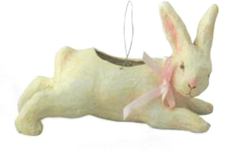 “Whimsical vintage papier mâché Easter figure with raffia and pink ribbon accents in a primitive, storybook style.”