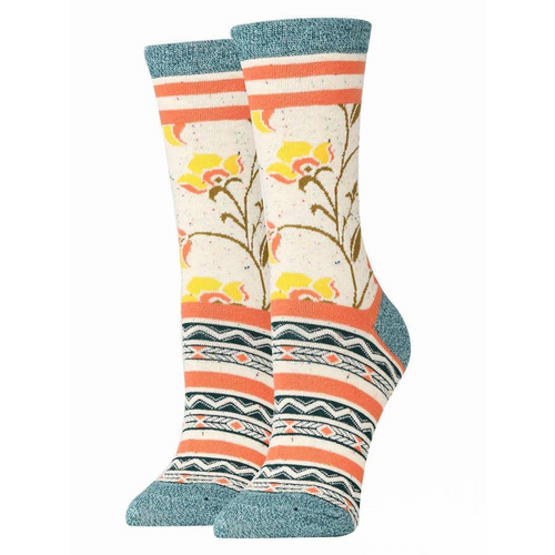 A pair of cream-colored crew socks with a teal cuff and toe section. The socks feature a repeating pattern of delicate yellow and orange flowers with green stems.