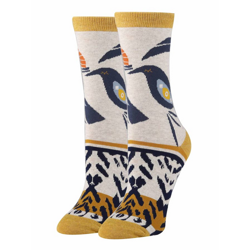 Pair of Clear Earth Premium Cotton Crew Socks with penguin pattern in navy, white, and yellow, fits shoe size 5-10.