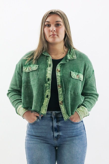 Stay effortlessly chic this spring with Trendy Threads Boutique's latest arrival – the Green Corduroy Jacket. With its textured fabric and casual cut, it's perfect for a stylish day out. 