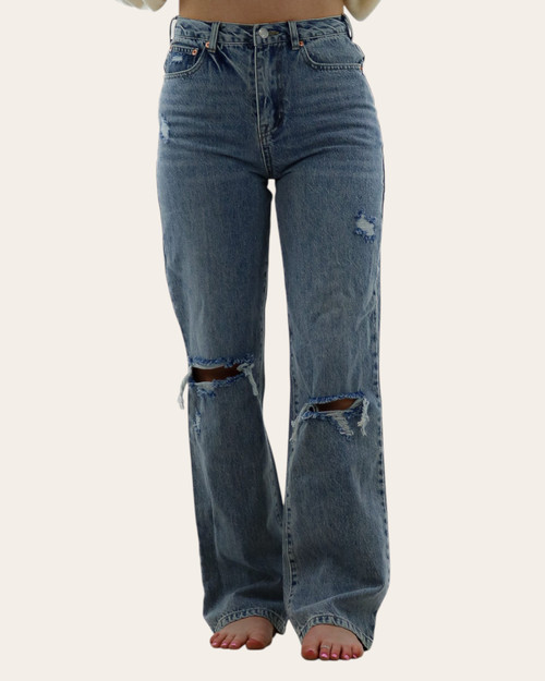 Front view of Nina Straight Cut Distressed Jeans in vintage wash, styled for fall fashion in Aberdeen South Dakota.