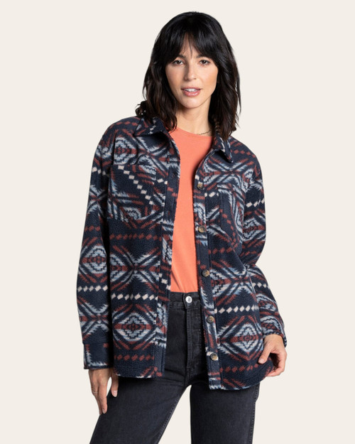 Front view of women’s Aztec fleece jacket buttoned over tee