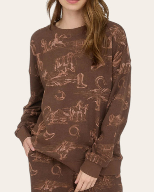 Front view of the Brown Sierra Western Pullover featuring a vintage western print, styled at our Roscoe, SD boutique.