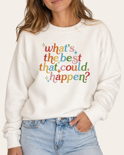 Front view of the cream What's The Best That Could Happen graphic sweatshirt featuring colorful positive lettering.