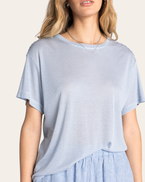 Close up front view of the blue and white striped short sleeve Opalite Tee by Thread and Supply.