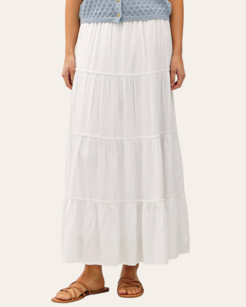 Front view of the true-to-size white tiered maxi skirt styled for hot mid-summer days in South Dakota.