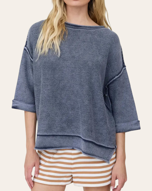 Front view of the navy inverted seam short sleeve sweatshirt styled for casual fall boutique fashion.