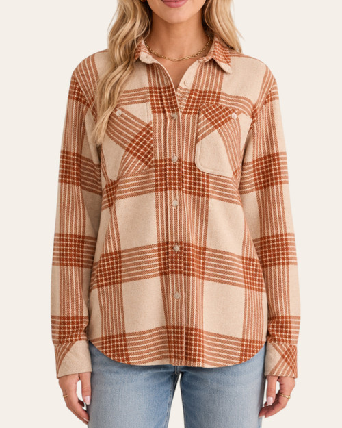 Front view of the ultra soft knit Kasey plaid button up in cream and rust