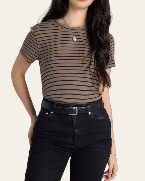 Front view of the lightly fitted Thread and Supply Annie top tucked into black jeans