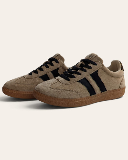 A pair of Corkys Heads Up Sneakers in light camel faux suede with black retro stripes.