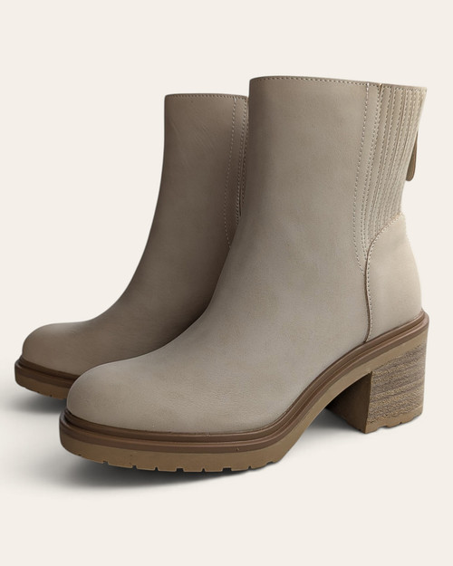A pair of The Megan Chelsea Fall Booties showcasing their sleek modern lines and bold edge.
