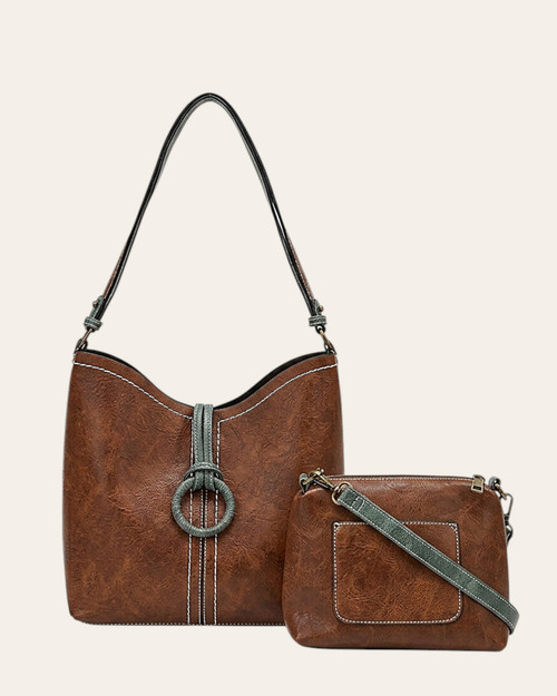 Liz Soto Alexa Hobo bucket bag in coffee vegan leather featuring a decorative ring detail and contrasting top stitching.