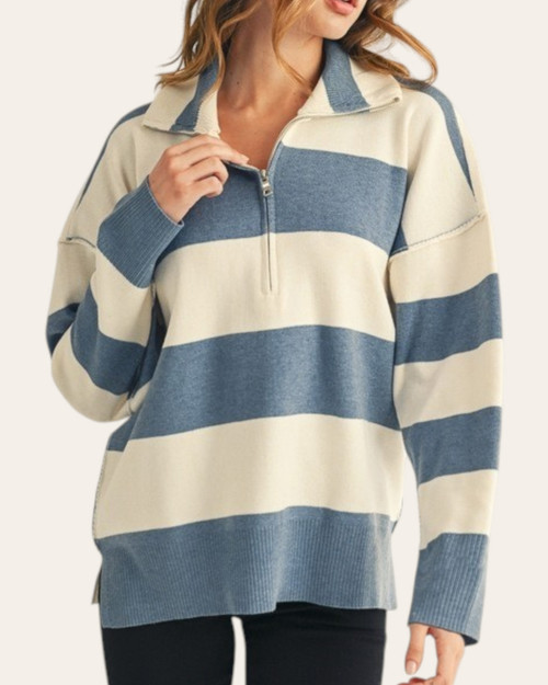Front view of the Cambridge Striped Sweater in Denim featuring wide stripes and an open half-zip collar.