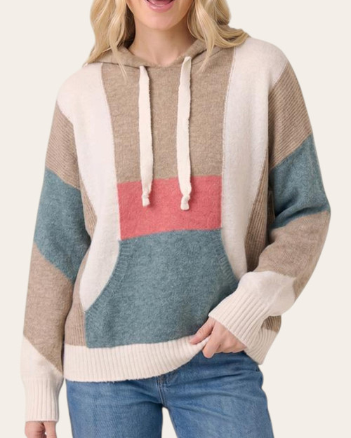 Front view of the Deena Color Block Hooded Sweater on a model, showing teal, coral, cream and light brown blocks, drawstrings and ribbed cuffs.