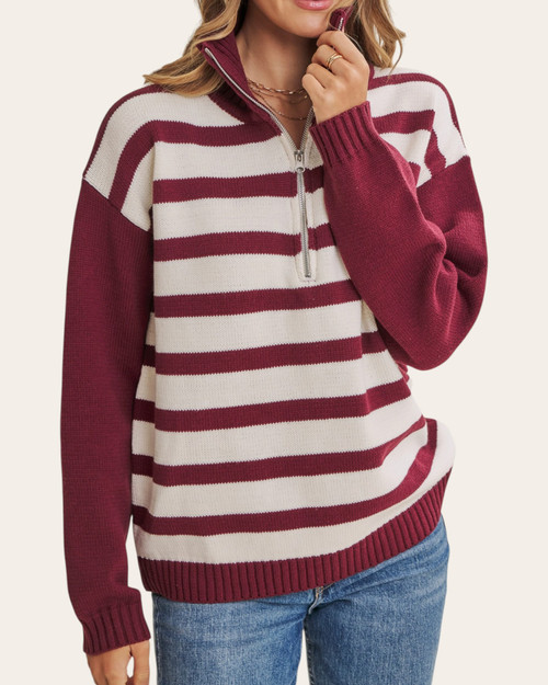 Front view of the Evergreen Half Zip Sweater - Dark Wine, with collar partly zipped, ivory stripes and solid wine sleeves.