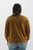 Back View of Trendy Threads Boutique's Spring Essentials: Plain Mustard Yellow Sweatshirt - Stylish and Comfortable