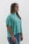 Trendy Threads Boutique presents a breath of fresh air for your spring wardrobe with this aqua pocket tee. Its easy-stretch fabric and relaxed fit capture the spirit of the season while offering a flattering look for any body type.
