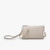 Elegant beige Riley Crossbody bag featuring a minimalist design with two external compartments and a middle zippered pocket, all secured with a singular top zipper. It includes a versatile, adjustable and detachable shoulder strap, along with six cardholder slots and a wristlet strap for different styling options.