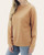 Side profile showing the slouchy, oversized style and longer length of the camel Thread and Supply Jaime Sweatshirt.