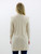 Back view of the Always Faithful Cardigan, featuring a simple design with ribbed detailing on the hem and cuffs.