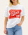 Front view of the white It's RIVER Time graphic tee featuring a vintage red graphic, modeled with light blue denim.