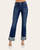 Woman wearing high-rise dark blue straight-leg jeans with frayed cuffs, front view styling.