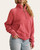 Side profile of the Jessa Quarter Zip showing the relaxed fit and ribbed thumbhole cuffs.
