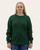 Front view of women’s forest green waffle knit sweater with crew neck and long sleeves.