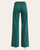 Back view of emerald green wide-leg corduroy pants with patch pockets and a structured high-rise waistband.