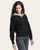 Side angle of the Thread & Supply Celia women’s quarter zip sweater featuring ribbed texture, beige fold-over collar, and relaxed fit — Trendy Threads Boutique style. Side angle of the Thread & Supply Celia women’s quarter zip sweater featuring ribbed texture, beige fold-over collar, and relaxed fit — Trendy Threads Boutique style.