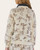 Back view of the Sierra Western Pullover in cream, featuring an allover vintage brown print of cowboys, cacti, horseshoes, and boots.