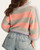 Back view of the ultra-soft Sunset Striped oversized sweater in peach and grey from our Roscoe, SD women's boutique.