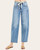 Front view of the Risen Jerzi Slouchy Barrel Jeans featuring a light wash and drawstring waist at our Roscoe, SD boutique.