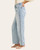 Side angle view of the light wash Judy Blue high rise Marlow jeans showing the pocket details and relaxed fit.