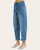 Angled view of the women's Risen patch pocket jeans in a medium wash denim.