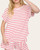 Model wearing the Carla red and white striped knit top, a casual spring arrival at our Roscoe boutique.