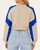 Back view of the cobalt blue and tan colorblock contrast edge cropped sweatshirt highlighting the relaxed fit.