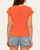 Back view of the tomato red washed crew neck tee showing the relaxed fit and short sleeves.