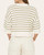 Back view of the Casey olive green and cream striped knit sweater with ribbed hem detailing.