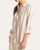 Side angle of the lightweight Tencel Thread and Supply Anna Shirt featuring roll-tab sleeves.