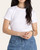 Close up front view of the ultra-soft Thread and Supply Annie Tee tucked into blue jeans.