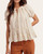Front view of the short sleeve Bridget Floral Blouse styled perfectly for late summer and early fall fashion.