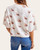 Back view of a women's short sleeve cropped sweater featuring an adorable fall mallard duck print.