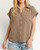Front view of the camel smocked shoulder v-neck blouse featuring a button front and chest pocket