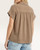 Back view of woman wearing a camel short sleeve smocked shoulder blouse with denim shorts